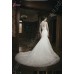   Кружевное свадебное платье силуэта русалка с V-образным вырезом